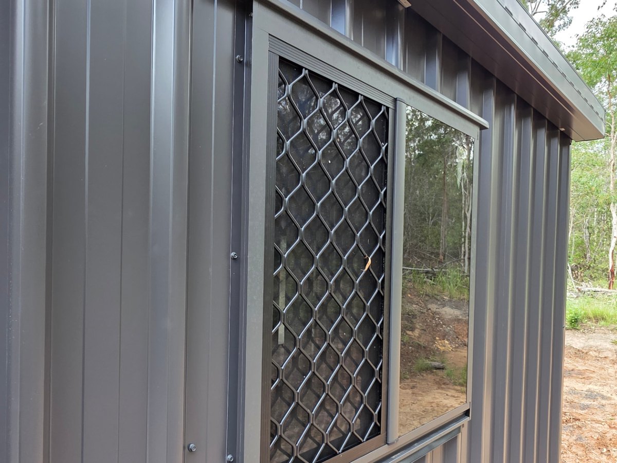 Finished COLORBOND® steel shed window detail completed by Spartan Sheds™ tradesmen